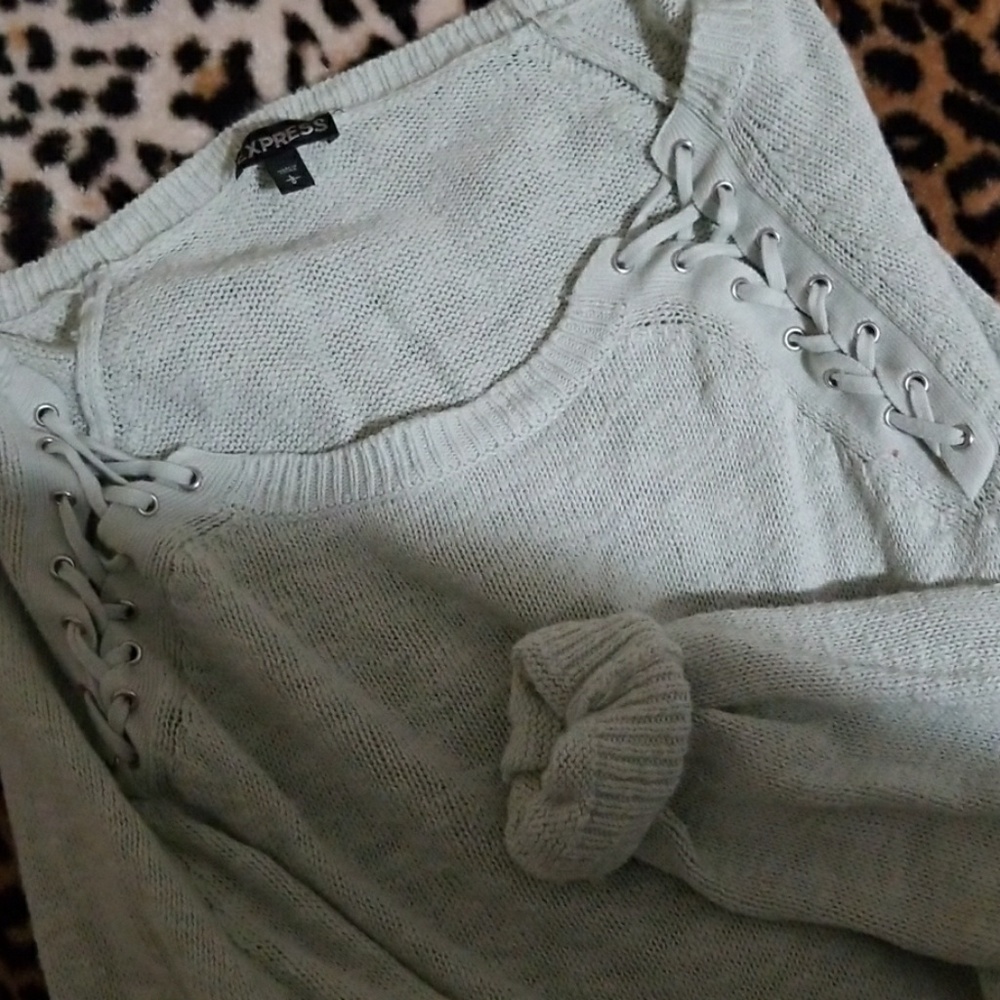 Lace up shoulders express sweater